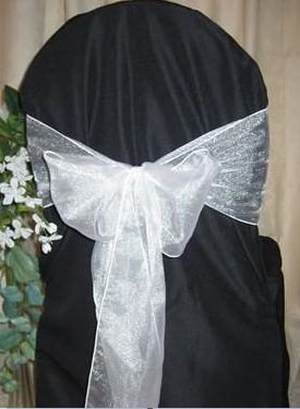 black chair cover with white organza sash